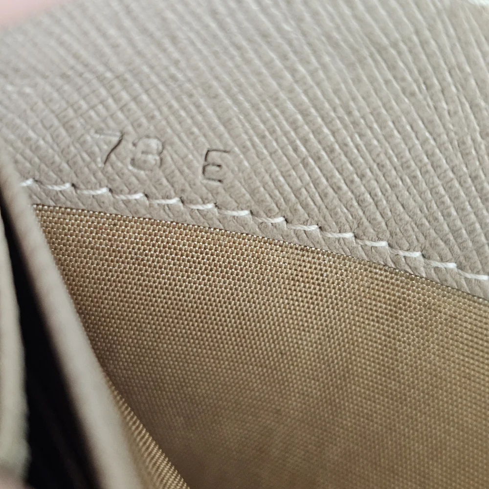 Prada Large Saffiano Zippy Leather Wallet - Picture 15 of 15